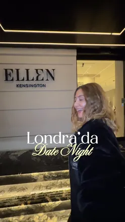 Couple enjoying a romantic dinner at Lacquer Room, Kensington, with elegant dishes and a stylish atmosphere.