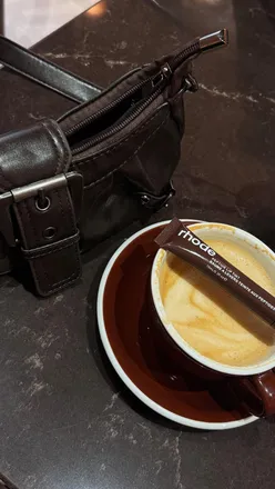 Excited visitors enjoying drinks at the new Fifteen Fifty One coffee shop in Anniesland, Glasgow.