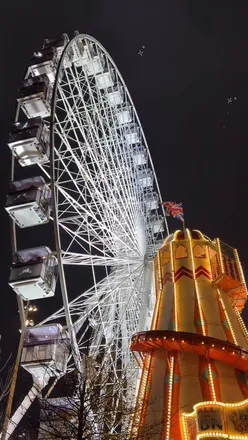 Delicious food from Manchester Christmas Markets featuring birria tacos, hot chocolate, and Dutch pancakes.