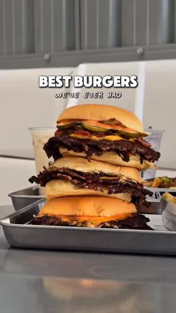 Delicious LA-style smash burgers at Blip Burgers in Croydon and Reading, featuring house-made sauces and New York banana pudding.