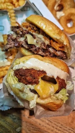Indulgent truffle feast at Shake Shack: White Truffle Burger, truffle fries, festive shakes, and winter comfort treats.
