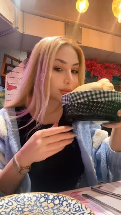 Authentic Lebanese dining at Babaghanouj in Kensington, London, featuring warm bread and flavorful dishes.