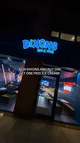 Exterior of Dixons Milk Ices' new shop on Leeds Road, Bradford, showcasing vibrant branding and inviting atmosphere.