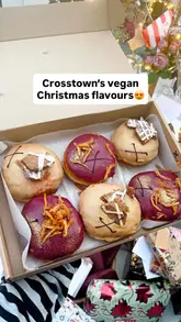 Vegan Christmas doughnuts from Crosstown: Gingerbread Caramel and Spiced Pear & Cinnamon, beautifully presented for the holidays.