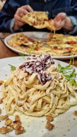 Calabrisella, a long-standing favourite of mine for Italian comfort food done properly.

@calabrisellacathays

We ordered:
Parmigiana 🧀 baked aubergine layered with tomato sauce, mozzarella & parmesan
Arancino Funghi 🍄 crisp risotto rice with a mushroom filling
Festive Linguine 🍝 pecan nut pesto with red wine-braised radicchio
Dello Chef Pizza 🍕 mozzarella, gorgonzola, goat’s cheese, smoked scamorza, nduja, walnuts, honey, Calabrian spianata & parmesan 
Tiramisu and homemade gelato was the sweet finish to our meal 🍨 

As always we were treated to great service, well executed dishes, bold flavours, and food that reflects the Calabrian roots the founders brought with them to Cardiff. With locations in Cathays, Canton, and their gelateria in Canton, Calabrisella continues to deliver comforting, hearty Italian food with character.

Invite

#italianfood #italiancardiff #cardiffeats #pizzacardiff