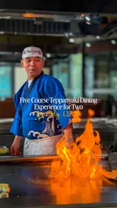 A couple visits a Teppanyaki restaurant, capturing the chef's cooking performance, including fire tricks, and the various courses of the meal. The video highlights the interactive nature of the dining experience.