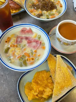 Enjoying breakfast at Taste of HK in Swansea with macaroni soup, scrambled eggs, and HK milk tea.