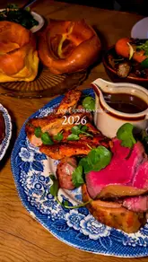 A compilation video showcasing various Sunday roast dinners at different venues in Bristol, Bath, and the Cotswolds. The video focuses on close-up shots of plated roasts, specifically highlighting the pouring of gravy over the meat and vegetables to create an appetizing effect.