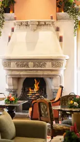 A montage showcasing the interior and amenities of Lawlor's of Naas hotel, featuring the fireplace, bar, exterior, bedroom, and afternoon tea service.