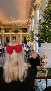 This reel showcases an afternoon tea experience at the Signet Library in Edinburgh. It features shots of the grand, historic interior, the table setting, and close-ups of the afternoon tea tiers, including pastries and scones. The creator is featured toasting with champagne, adding a personal touch to the elegant setting.