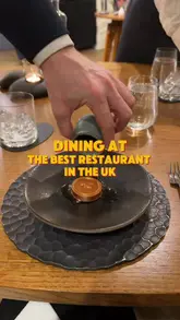 A detailed vlog documenting a visit to L'Enclume, a three-Michelin-starred restaurant in the Lake District. The video showcases the dining experience, including the service, the menu, the food presentation, and the atmosphere, while also mentioning the associated accommodation and farm.