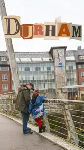 A family travel reel documenting a 'Twixmas' break in Durham, featuring a stay at the Radisson Blu, breakfast, and sightseeing at Durham Cathedral.