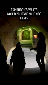 A family-friendly vlog showcasing a guided walking tour of the Edinburgh Vaults, highlighting the historical and spooky aspects of the experience.