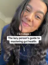 A talking-head style video featuring a creator sharing health tips, specifically focusing on gut health. The video is shot in a casual, selfie-style format with clear audio and visual quality.