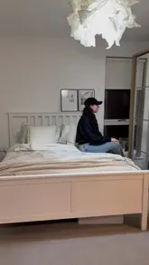 Rested parents enjoying quality sleep thanks to the Emma Sleep Hybrid Thermosync Mattress in the Winter Sale.
