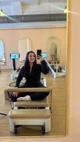 First Pilates experience at Air Pilates Studio in Glasgow, enjoying a joyful fitness session.