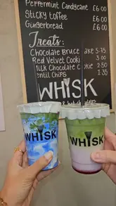 A short, upbeat reel showcasing a visit to Whisk cafe, featuring various matcha lattes, NYC-style cookies, and a chocolate cake. The video uses a montage style with frequent cuts to maintain interest, highlighting both the interior ambiance and the food/drink products.