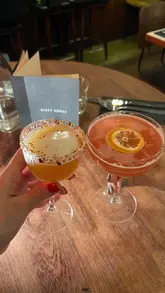 A promotional reel for Dirty Bones featuring their non-alcoholic cocktail menu and various food dishes. The video uses quick cuts to showcase the venue's atmosphere and menu items.