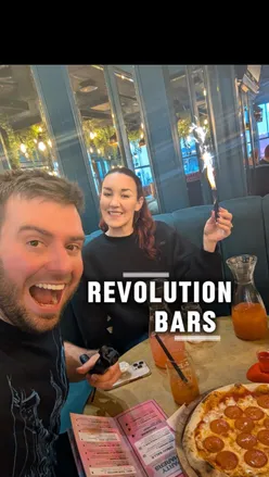 It’s Revs o’clock 🍹✨
We headed down to @revolution_brighton and honestly, January just got a whole lot better. They’re offering 33% off food when you order through the Revs app, which makes it such a bargain for lunch (or let’s be real, drinks too 👀).

We tried the pepperoni pizza, ridiculously cheesy and seriously delicious 🍕🤍

The drinks menu was huge, so of course we went all out with cocktail pitchers.
🍹 I went for the Giant Rumball with spiced rum, mango, lime, grenadine and Red Bull.
🍹 Raquel chose the Absolutely Fabulous with Absolut vodka, raspberry and watermelon vodka, Malibu, plus shots of strawberry, pineapple and dragon fruit, topped with Red Bull.

To finish, a round of flavoured shots because why not 😅 Jelly Baby, Strawberry & Cream and Flumps. Tomorrow’s headache is a problem for future us 🥴💃

Bring on the night ✨🍸
@revolutionbars