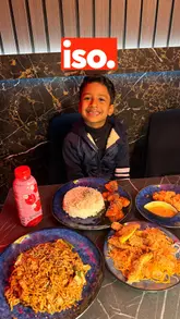 A young creator visits ISO Sushi, providing a review of the food and experience. The video features shots of the exterior, interior, and various dishes including sushi, tempura, and mochi, with the creator offering commentary on the taste and texture.