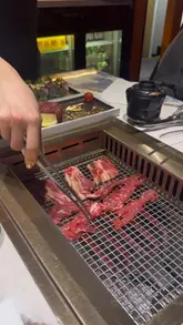 A montage of food dishes and table-side BBQ cooking at High Yaki restaurant, featuring sashimi, wagyu beef, sushi rolls, and noodle soup.