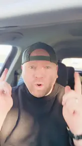 A creator reviews a kebab and chips meal from Herrons Country Fried Chicken while sitting in his car. He discusses the nostalgia of the food and provides a casual, enthusiastic commentary on the meal.
