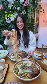 A video showcasing a visit to Mulan Noodle, a Northern Chinese restaurant in South London, highlighting their hand-pulled noodles, dumplings, and bubble tea.