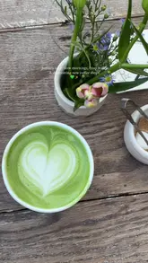 A short, aesthetic montage capturing a slow morning walk in London, featuring nature scenes, a visit to a coffee shop called Kaffee, and close-ups of pastries and a matcha latte.