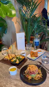 A short video showcasing a family dining experience at a Gordon Ramsay restaurant, highlighting the 'kids eat free' offer and the presence of arts and crafts activities for children.