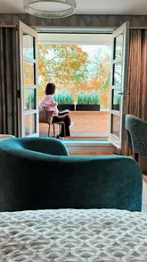 A montage showcasing the facilities and atmosphere of Sopwell House, featuring shots of the outdoor spa, hotel bedroom, bathroom, and pool area, set to relaxing music.