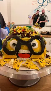 The video features a creator visiting 'The Big Bakes' in Liverpool, an immersive baking experience. The creator walks the viewer through the process of entering the tent, following instructions, baking a cake, and the final judging. It highlights the fun, interactive nature of the activity.