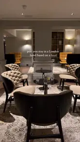 A tour of the Holmes Hotel in London, highlighting its Sherlock Holmes-inspired interior design, unique gym facilities, and breakfast offerings at the on-site restaurant.
