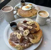 Breakfast spots in Leeds featuring pancakes, pastries, and Turkish eggs at local favorites like Moose Coffee and Layne's Café.