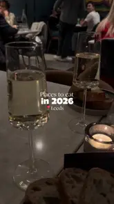 A listicle-style video recommending five different dining spots in Leeds, featuring a mix of restaurants, street food, and bars. The video showcases various dishes, drinks, and interior settings for each location.
