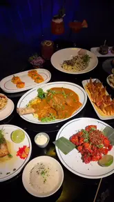 A high-quality promotional reel for The Banc, a North London restaurant and lounge. The video features a montage of signature dishes, including steak and pasta, alongside cocktail preparation and shots of the stylish, floral-decorated interior. It captures the transition from dining to the lounge atmosphere, including shisha.