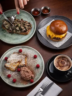 Bold Street Coffee at Duke Street Market offers award-winning coffee, indulgent French toast, and comforting sausage buoys.