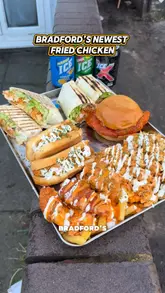 A fast-paced review of a new fried chicken shop in Bradford, featuring a variety of menu items including burgers, wraps, and loaded fries. The creator samples different spice levels and provides feedback on the quality and value of the food.
