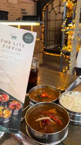 Delicious Lite Tiffin menu featuring Goan Fish Curry and Mother Butter Chicken at Mowgli Street Food.