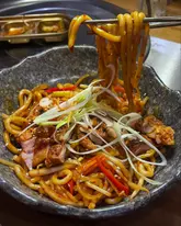 Delicious Korean meal at Soju and Gogi in Newcastle, featuring spicy beef soup, kimchi pancakes, and Korean fried chicken.