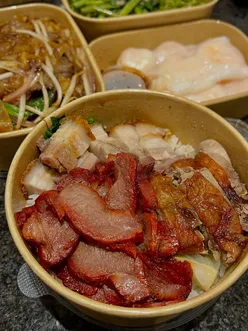 Delicious Cantonese takeaway featuring crispy pork belly, prawn cheung fun, dumplings, and chicken satay from The Good Fortune.