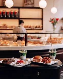 New Fred Bakery on Margaret Street, Oxford Circus offers fresh breads, pastries, and drinks in a chic Parisian setting.