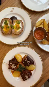 A short, visually focused reel showcasing small plates and craft beer at The Welly in Bath. The video features close-up shots of dishes like scotch eggs, ox cheek, and beef dripping fries, alongside beer pours, set to music with text overlays describing the food and venue.