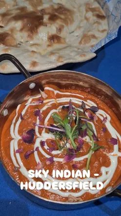 Delicious Indian dining at Sky Indian in Huddersfield, featuring chicken tikka, lamb chops, and more.