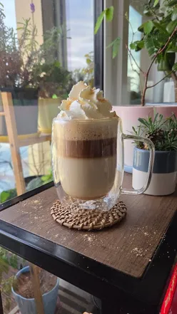 A simple kinako latte with a nutty flavor, served in a cozy mug, perfect for a relaxing drink.