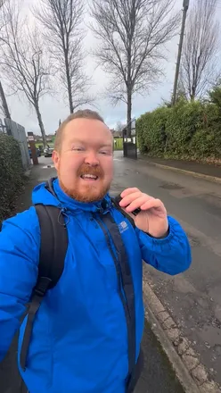 Enjoying a massive 'Attack Breakfast' at Snack Attacks cafe in Patchway, featuring delicious sausages, eggs, and bacon.