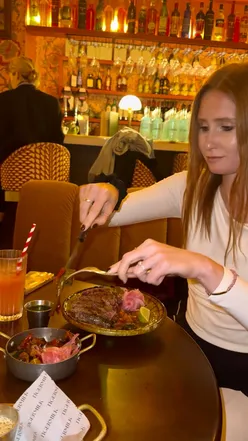 Delicious meal at Tiger Milk in Soho featuring quesadillas, steak, desserts, and cocktails with great company.