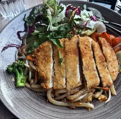 Delicious yaki udon with katsu chicken and tuna maki roll at Hokkaido restaurant in Southampton, showcasing vibrant dishes.