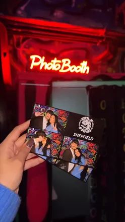 Friends enjoying crazy mini golf and cocktails at Golf Fang, promoting winter fun for £20 per person.