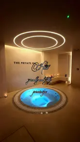 A serene and polished tour of a private spa facility in London, showcasing the various rooms, pool, jacuzzi, sauna, and steam room, while emphasizing the privacy and luxury of the experience.