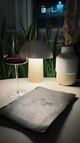 Mayvn café in Edinburgh, a relaxing spot with red wine, late-night coffee, and a creative atmosphere for unwinding.